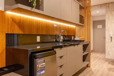 A cozinha ou kitchenette de Confortável Loft com Vista para o Mar - Condomínio com Piscina