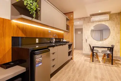 A cozinha ou kitchenette de Confortável Loft com Vista para o Mar - Condomínio com Piscina