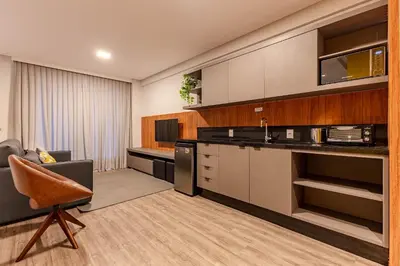 A cozinha ou kitchenette de Confortável Loft com Vista para o Mar - Condomínio com Piscina