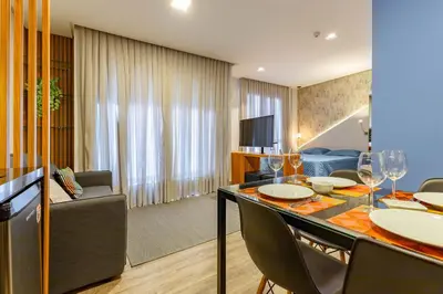 Uma área de estar em Confortável Loft em Condomínio com Piscina