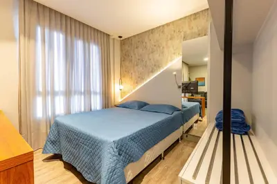 Uma cama ou camas num quarto em Confortável Loft em Condomínio com Piscina