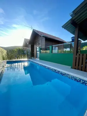 A piscina em ou perto de Chalés Costa Esmeralda Com Piscina , Bombinhas