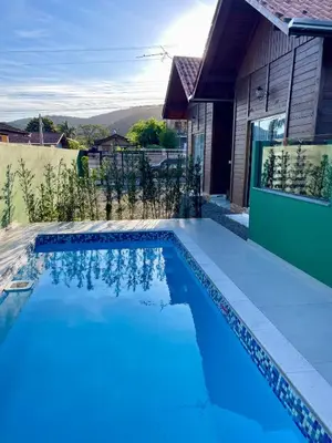A piscina em ou perto de Chalés Costa Esmeralda Com Piscina , Bombinhas