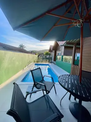 A piscina em ou perto de Chalés Costa Esmeralda Com Piscina , Bombinhas