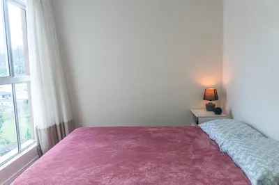 Uma cama ou camas num quarto em Smart Apartment - The 808