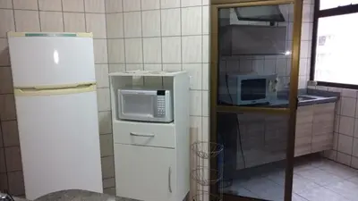 A cozinha ou kitchenette de Apartamento Meia Praia Itapema