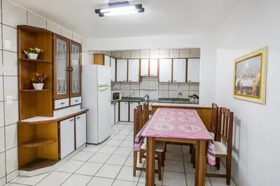 A cozinha ou kitchenette de 103 Varanda vista mar - 80m da praia - até 10p