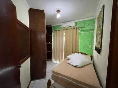 Uma cama ou camas num quarto em Paraíso Litorâneo