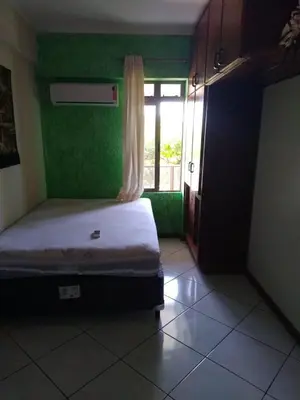 Uma cama ou camas num quarto em Paraíso Litorâneo