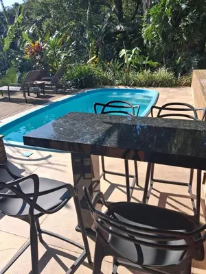 A piscina em ou perto de Suíte Vista Mar Praia Estaleiro Balneário Camboriú