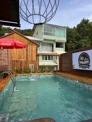 A piscina em ou perto de Pousada Recanto do Canário 3