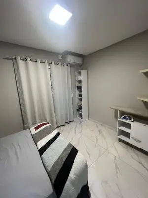 Uma cama ou camas num quarto em Pousada Recanto do Canário 3