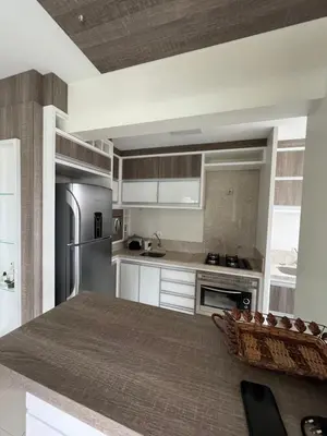 A planta de Apto de 3 quartos na Praia de Palmas, com garagem