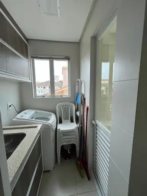 A planta de Apto de 3 quartos na Praia de Palmas, com garagem
