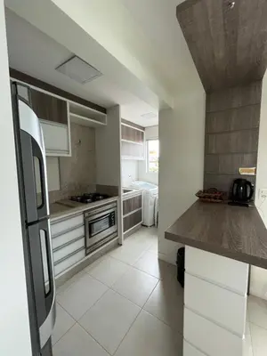 A planta de Apto de 3 quartos na Praia de Palmas, com garagem