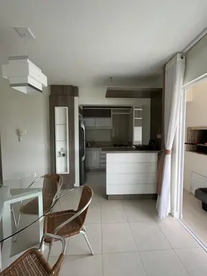 A planta de Apto de 3 quartos na Praia de Palmas, com garagem