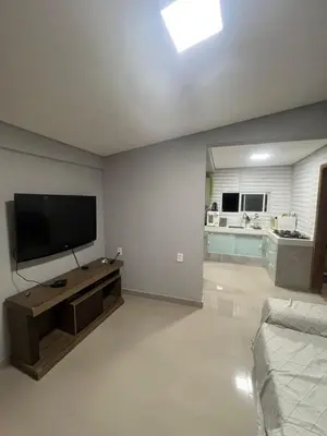 Uma televisão e/ou sistema de entretenimento em Pousada Recanto do Canário 4