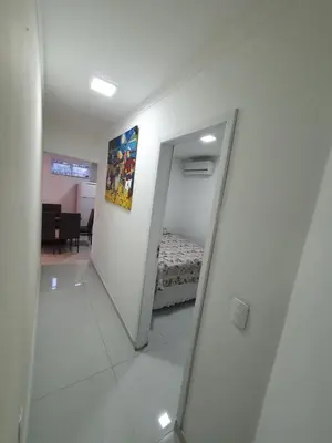 Uma cama ou camas num quarto em Recanto Residencial Mariscal - Apartamento 2 quartos