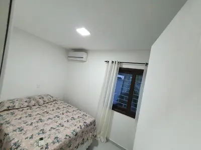 Uma cama ou camas num quarto em Recanto Residencial Mariscal - Apartamento 2 quartos