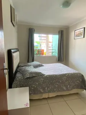 Uma cama ou camas num quarto em Casa com piscina