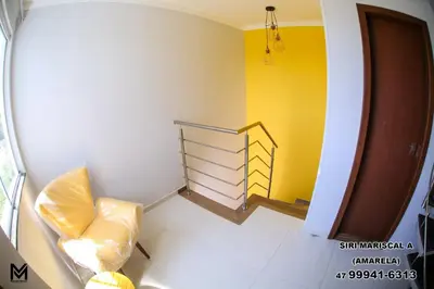 Uma cama ou camas num quarto em Siri Mariscal Bombinhas C Piscina