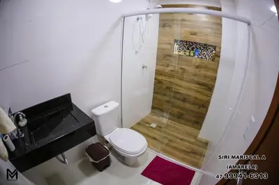 Uma casa de banho em Siri Mariscal Bombinhas C Piscina
