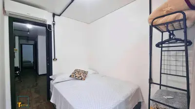Uma cama ou camas num quarto em APs em Container na Meia Praia, Itapema, SC - Tetto Stays