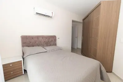 Uma cama ou camas num quarto em 450 - Excelente 3 quartos em Bombas