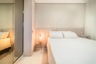 Uma cama ou camas num quarto em 665 - Belíssimo Apartamento na Praia de Bombas
