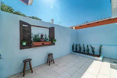 Uma varanda ou terraço em Casa na praia de Morrinhos Bombinhas para 10 pessoas, Excelente localização