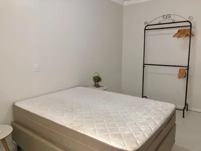 Uma cama ou camas num quarto em Apartamento de temporada rua 252 - Meia Praia - Itapema