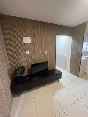 Uma televisão e/ou sistema de entretenimento em Pousada Recanto do Canário 2