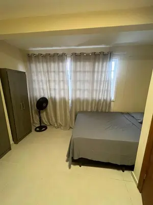 Uma cama ou camas num quarto em Pousada Recanto do Canário 2