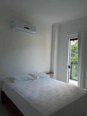 Uma cama ou camas num quarto em Casa geminada 2 no Mariscal