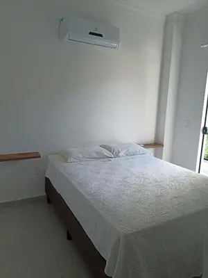 Uma cama ou camas num quarto em Casa geminada 2 no Mariscal