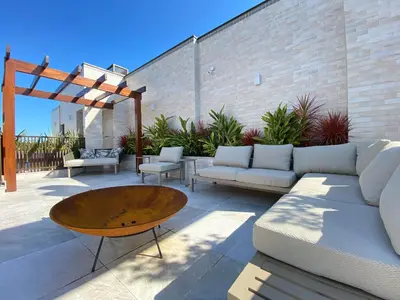 Uma área de estar em Aluguel Apartamento Sunrise 2 suítes