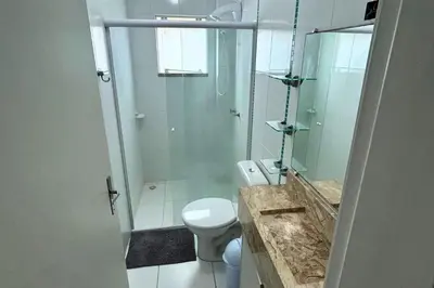 Uma casa de banho em Apartamento 3 dormitórios na praia de Bombas