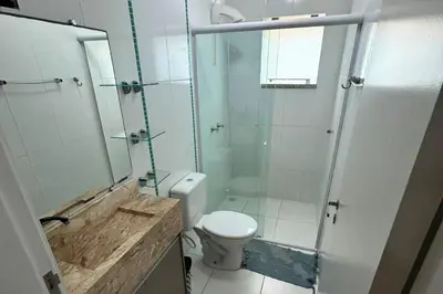 Uma casa de banho em Apartamento 3 dormitórios na praia de Bombas