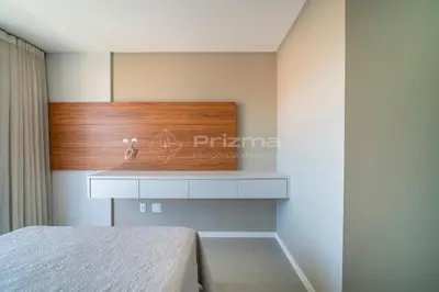 Uma cama ou camas num quarto em Lindo Duplex na Praia de Canto Grande com ótima localização