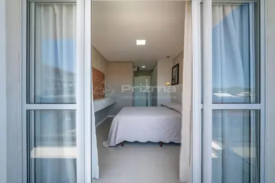 Uma cama ou camas num quarto em Lindo Duplex na Praia de Canto Grande com ótima localização