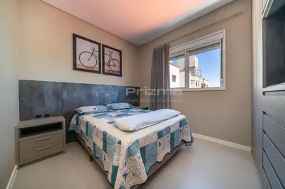 Uma cama ou camas num quarto em Lindo Duplex na Praia de Canto Grande com ótima localização