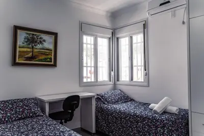 Uma cama ou camas num quarto em #002 Linda casa 100 m praia Palmas equipadíssima