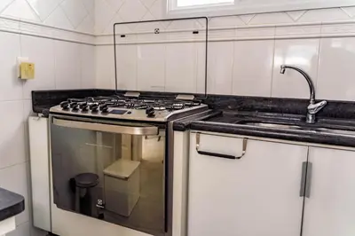 A cozinha ou kitchenette de #002 Linda casa 100 m praia Palmas equipadíssima