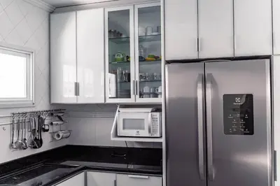 A cozinha ou kitchenette de #002 Linda casa 100 m praia Palmas equipadíssima