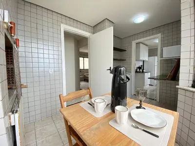 A cozinha ou kitchenette de DCA51 - Pé na areia, Churrasqueira, 2 Garagens