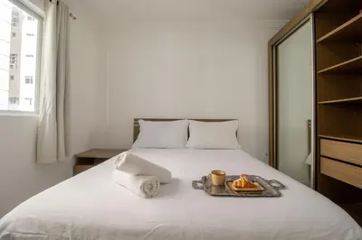 Uma cama ou camas num quarto em WAL51 - Churrasq, Quadra Mar, 3 Dorm, Climatizado
