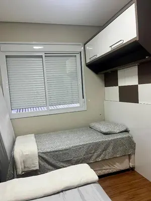 Uma cama ou camas num quarto em Apartamento novo em Palmas, climatizado e próximo à praia!