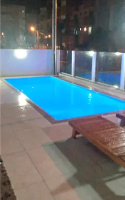 A piscina em ou perto de Apto na praia de Palmas, climatizado, com piscina, próximo ao mar e com jardim privativo