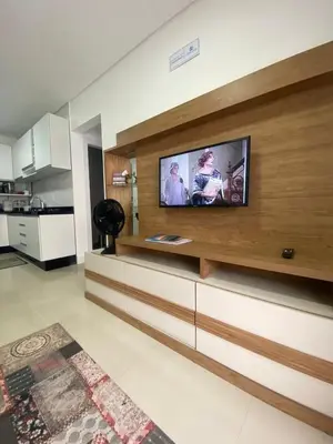 A cozinha ou kitchenette de Apto na praia de Palmas, climatizado, com piscina, próximo ao mar e com jardim privativo