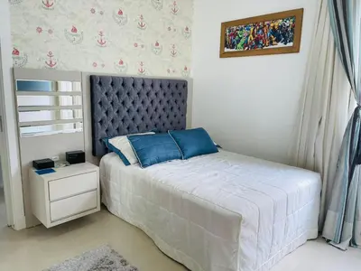Uma cama ou camas num quarto em Cobertura Infinity Blue - Itapema/SC